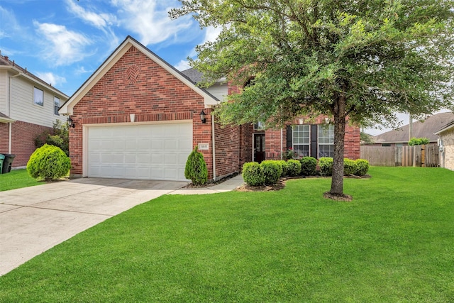 31611 Cape May Ct, Spring, TX 77386 - traditional-style home with brick siding, a garage, and concrete driveway