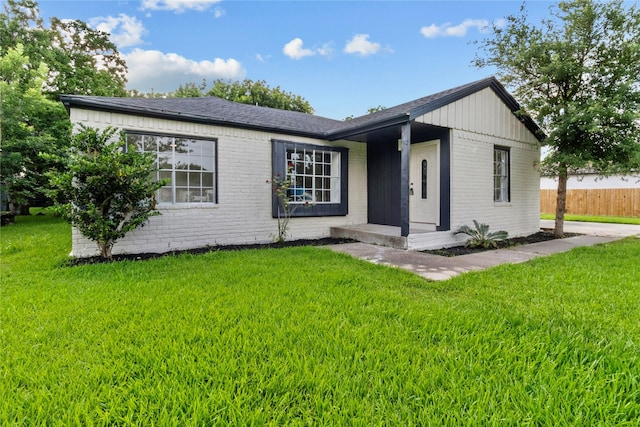 3805 19th St N, Texas City, TX 77590 - ranch-style house with brick siding and a shingled roof