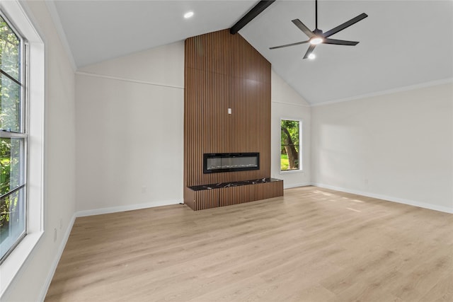 3805 19th St N, Texas City, TX 77590 - unfurnished living room with a large fireplace, high vaulted ceiling, beamed ceiling, light wood-style floors, and ceiling fan