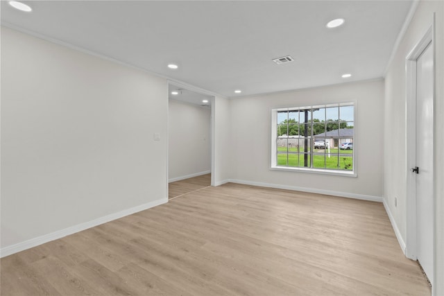 3805 19th St N, Texas City, TX 77590 - spare room with crown molding, recessed lighting, baseboards, and light wood-style floors