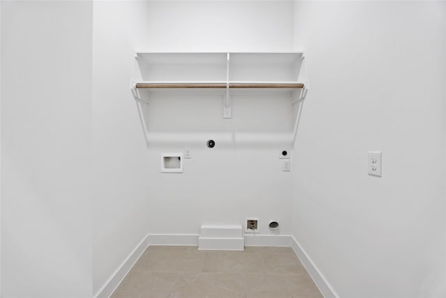 7719 Orebo St, Houston, TX 77088 - laundry room with hookup for an electric dryer, gas dryer hookup, hookup for a washing machine, and baseboards