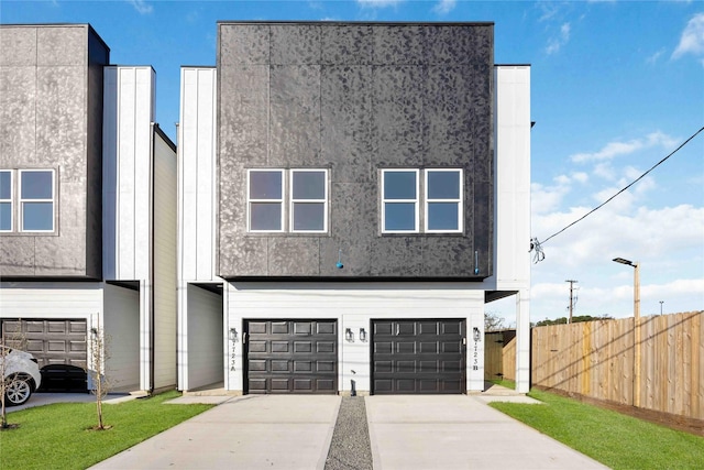 7719 Orebo St, Houston, TX 77088 - view of front of home with a garage, stucco siding, and concrete driveway