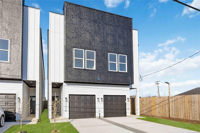 7719 Orebo St, Houston, TX 77088 - view of front facade featuring a garage and driveway