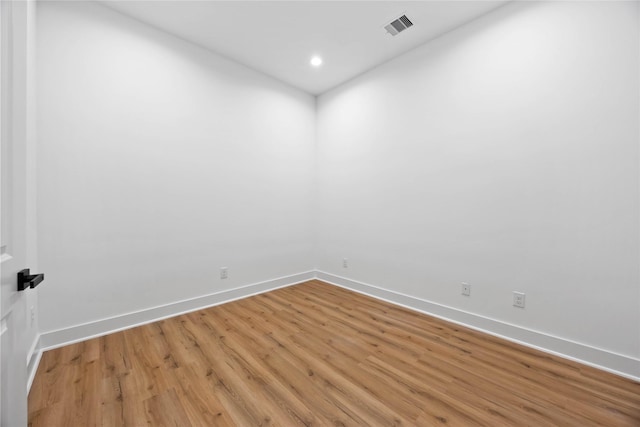 7719 Orebo St, Houston, TX 77088 - spare room featuring light wood finished floors, baseboards, and recessed lighting