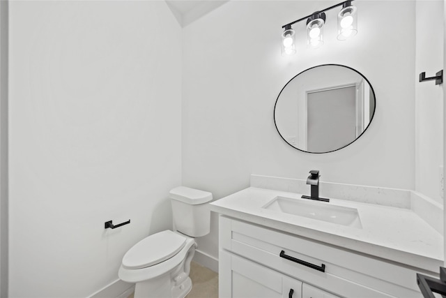 7719 Orebo St, Houston, TX 77088 - half bathroom featuring vanity, toilet, and baseboards