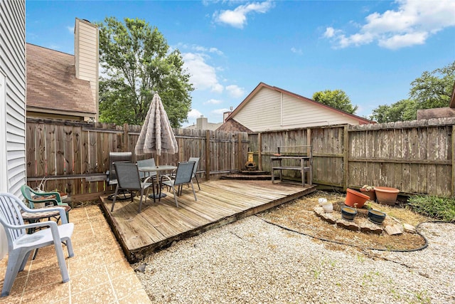 16019 Juniper Grove Dr, Houston, TX 77084 - deck featuring outdoor dining area and a fenced backyard