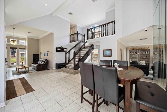 16019 Juniper Grove Dr, Houston, TX 77084 - dining space with high vaulted ceiling, stairway, ceiling fan, tile patterned flooring, and beam ceiling