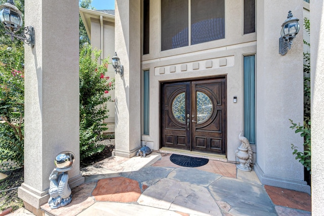 16206 Lobo Ln, Spring, TX 77379 - view of exterior entry with stucco siding