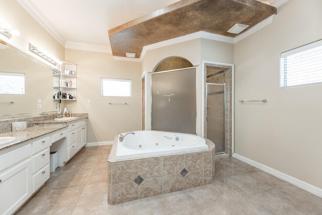 16206 Lobo Ln, Spring, TX 77379 - full bathroom featuring double vanity, a stall shower, a jetted tub, plenty of natural light, and ornamental molding