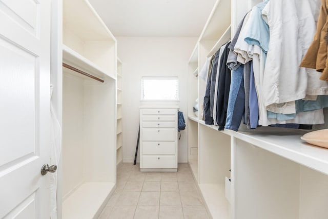 16206 Lobo Ln, Spring, TX 77379 - walk in closet featuring light tile patterned floors