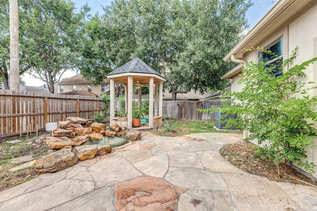 16206 Lobo Ln, Spring, TX 77379 - fenced backyard featuring a patio area