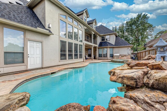16206 Lobo Ln, Spring, TX 77379 - view of pool featuring a patio area and a pool with connected hot tub