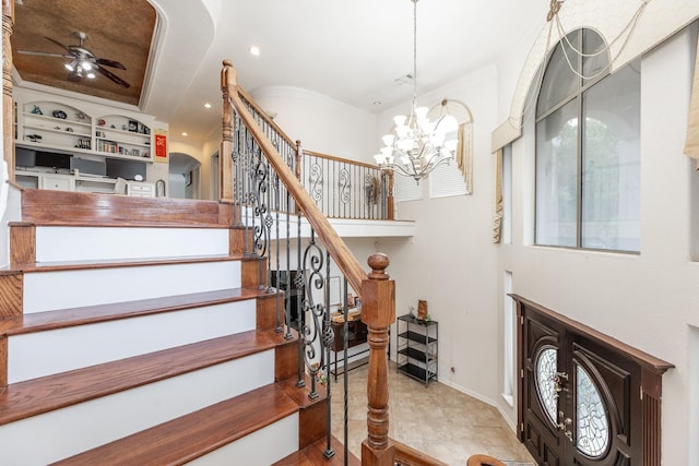 16206 Lobo Ln, Spring, TX 77379 - staircase featuring a ceiling fan, a chandelier, recessed lighting, and baseboards