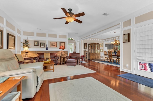 3407 Gold Candle Dr, Spring, TX 77388 - living room featuring wood finished floors, a ceiling fan, and a chandelier