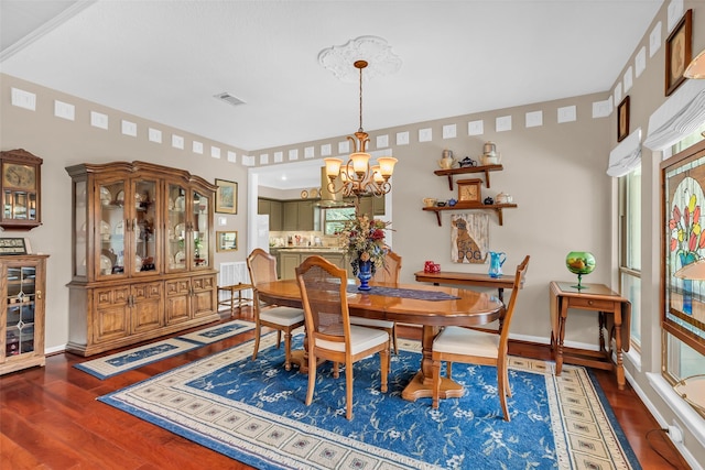 3407 Gold Candle Dr, Spring, TX 77388 - dining space featuring a chandelier, wood finished floors, and baseboards