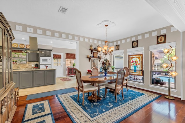 3407 Gold Candle Dr, Spring, TX 77388 - dining space with a chandelier and hardwood / wood-style floors