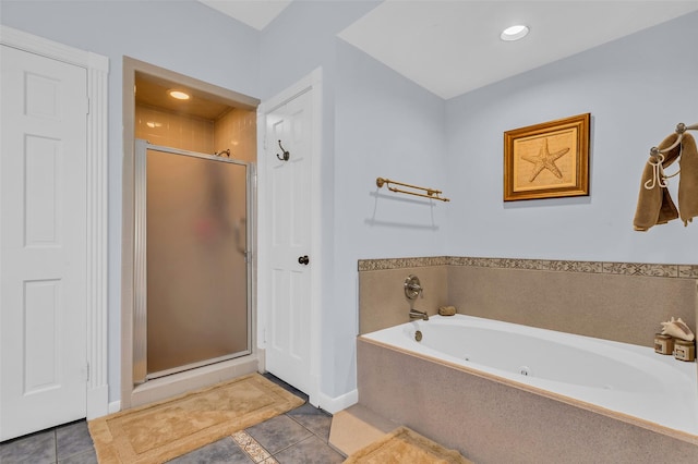 3407 Gold Candle Dr, Spring, TX 77388 - bathroom with a shower stall, tile patterned floors, a tub with jets, and baseboards
