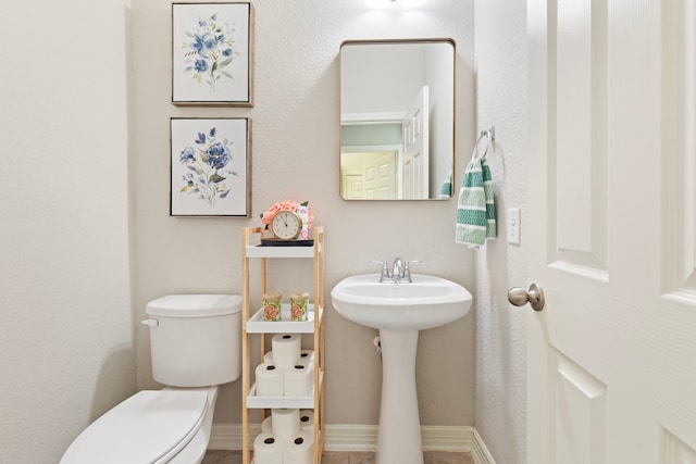 9414 Peralta Creek Ct, Cypress, TX 77433 - bathroom featuring toilet and baseboards