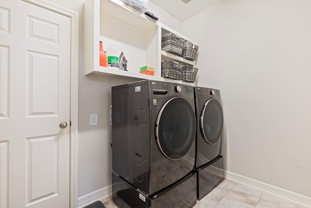 9414 Peralta Creek Ct, Cypress, TX 77433 - washroom featuring washing machine and dryer and baseboards