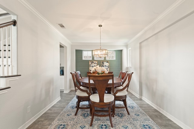 9414 Peralta Creek Ct, Cypress, TX 77433 - dining area with dark wood-type flooring, a chandelier, ornamental molding, and baseboards