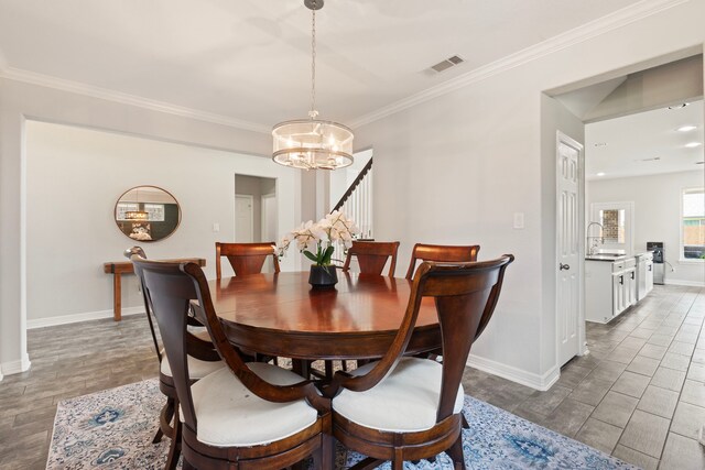 9414 Peralta Creek Ct, Cypress, TX 77433 - dining room featuring a chandelier, baseboards, and crown molding