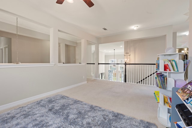 9414 Peralta Creek Ct, Cypress, TX 77433 - recreation room with a ceiling fan, carpet floors, baseboards, and a chandelier