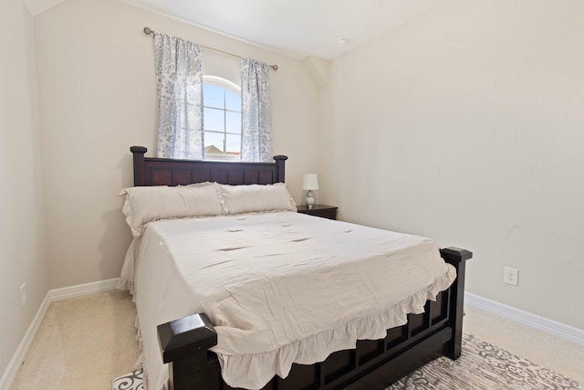9414 Peralta Creek Ct, Cypress, TX 77433 - carpeted bedroom featuring baseboards and lofted ceiling