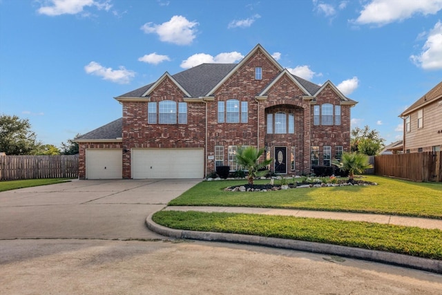 2402 Leslie Ln, Deer Park, TX 77536 - traditional-style house featuring driveway, brick siding, a garage, and roof with shingles