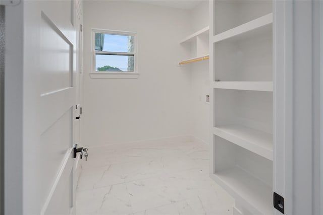 511 Laurel St, La Marque, TX 77568 - bathroom with marble look tiles and baseboards