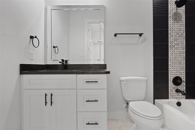 511 Laurel St, La Marque, TX 77568 - full bathroom with baseboards, vanity, toilet, and shower / washtub combination