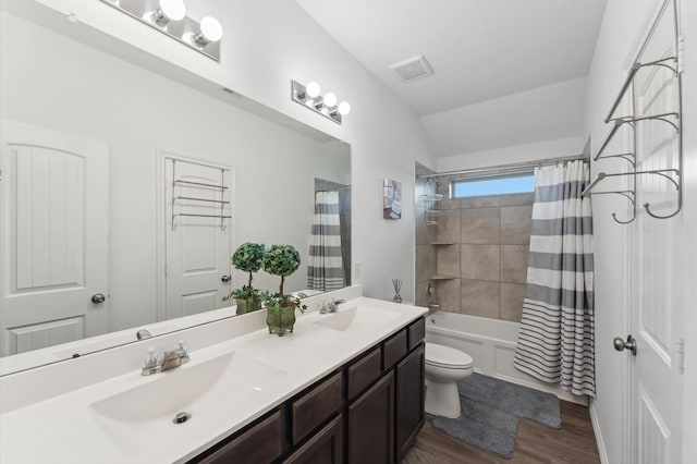 19018 Cicerone Ct, New Caney, TX 77357 - bathroom with toilet, double vanity, shower / bathtub combination with curtain, and wood finished floors