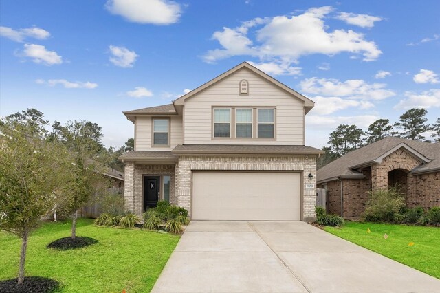 19018 Cicerone Ct, New Caney, TX 77357 - traditional-style house with brick siding, concrete driveway, a garage, and a front yard