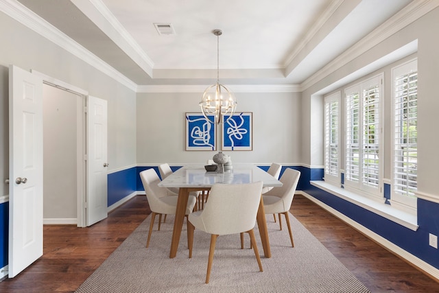 51 N Frosted Pond Dr, The Woodlands, TX 77381 - dining room featuring a raised ceiling, wood finished floors, a chandelier, baseboards, and ornamental molding