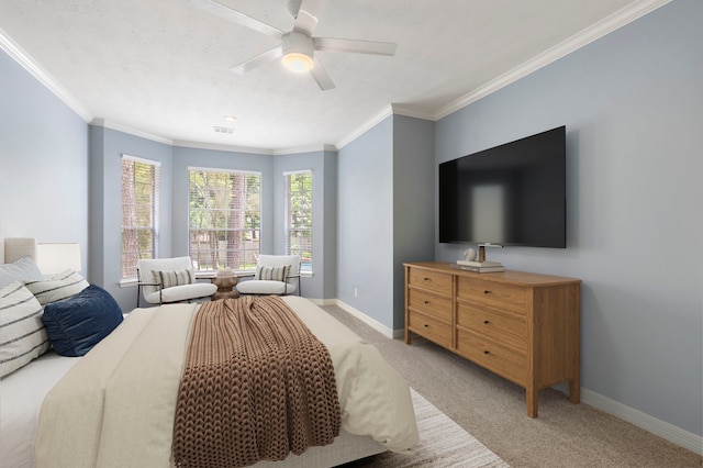 51 N Frosted Pond Dr, The Woodlands, TX 77381 - bedroom with light colored carpet, baseboards, crown molding, and a ceiling fan