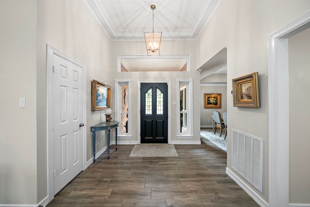14211 Manderly Dr, Houston, TX 77077 - entrance foyer featuring dark wood-style flooring, ornamental molding, and a high ceiling