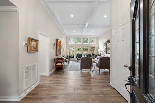 14211 Manderly Dr, Houston, TX 77077 - entryway with beam ceiling, recessed lighting, wood finished floors, crown molding, and baseboards