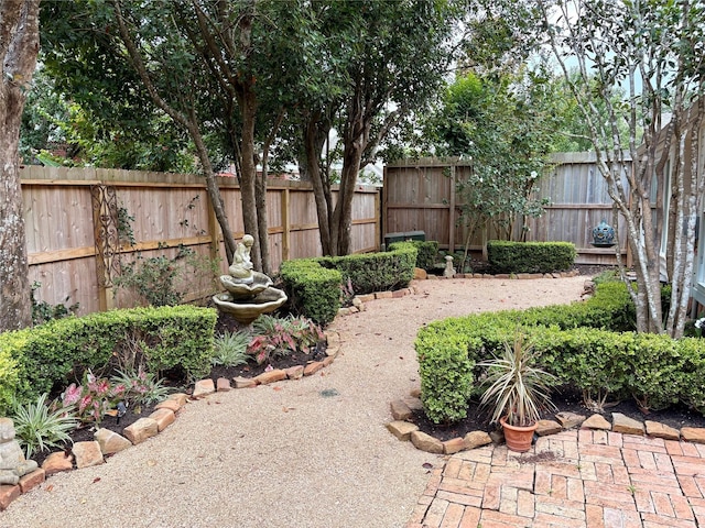 14211 Manderly Dr, Houston, TX 77077 - fenced backyard with a patio area