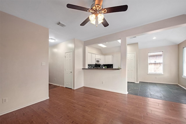16315 Redbud Berry Ln, Cypress, TX 77433 - unfurnished living room with dark wood finished floors, a ceiling fan, baseboards, and recessed lighting