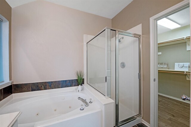 16315 Redbud Berry Ln, Cypress, TX 77433 - bathroom with a shower stall, a tub with jets, and a spacious closet