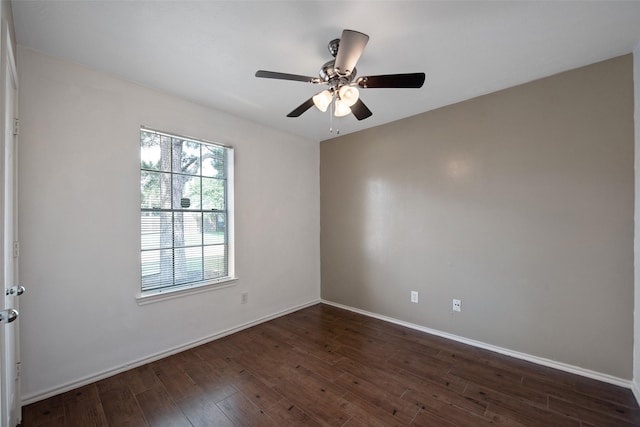16315 Redbud Berry Ln, Cypress, TX 77433 - spare room with dark wood finished floors, baseboards, and a ceiling fan