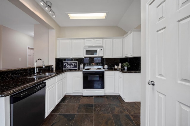 16315 Redbud Berry Ln, Cypress, TX 77433 - kitchen featuring white appliances, a sink, a peninsula, backsplash, and white cabinetry