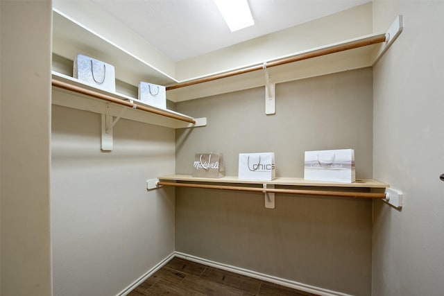 16315 Redbud Berry Ln, Cypress, TX 77433 - spacious closet featuring dark wood-style flooring