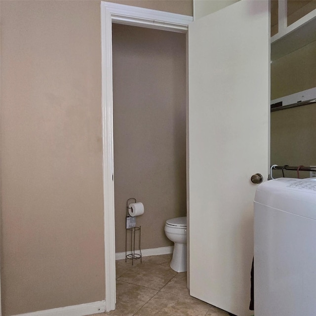 20339 Acapulco Cove Dr, Humble, TX 77346 - bathroom with toilet, tile patterned floors, and baseboards