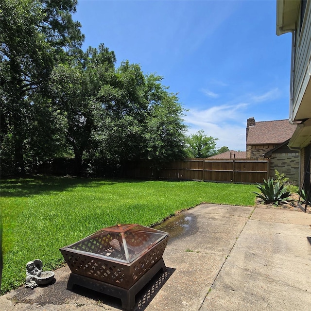 20339 Acapulco Cove Dr, Humble, TX 77346 - view of yard featuring an outdoor fire pit and a patio area