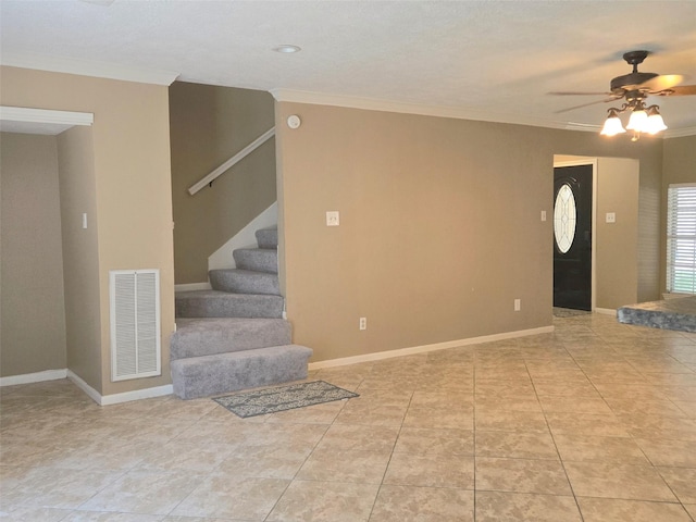 20339 Acapulco Cove Dr, Humble, TX 77346 - unfurnished living room featuring ornamental molding, a ceiling fan, stairs, baseboards, and light tile patterned floors