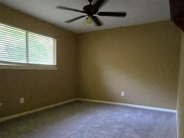 20339 Acapulco Cove Dr, Humble, TX 77346 - carpeted empty room with ceiling fan and baseboards