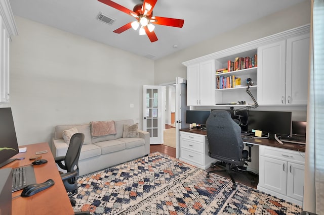 2103 Gaylin Hills Ct, Spring, TX 77386 - home office featuring a ceiling fan, wood finished floors, and built in study area