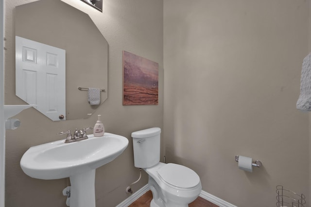 2103 Gaylin Hills Ct, Spring, TX 77386 - bathroom featuring toilet and baseboards
