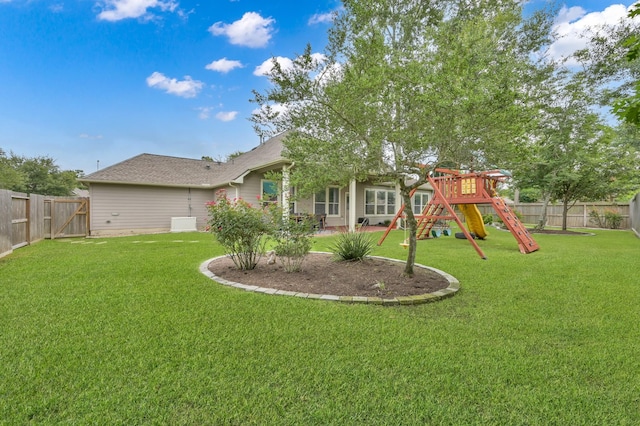 2103 Gaylin Hills Ct, Spring, TX 77386 - fenced backyard featuring a playground