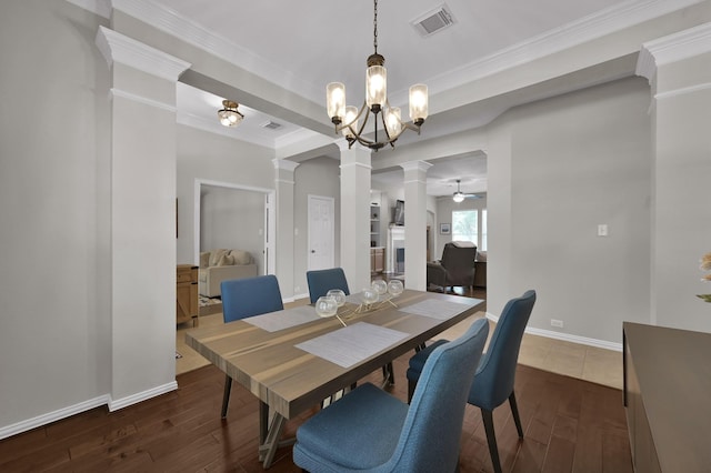 2103 Gaylin Hills Ct, Spring, TX 77386 - dining area with decorative columns, wood-type flooring, a chandelier, crown molding, and ceiling fan